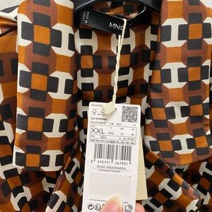 Silky Geometric Wrap Top